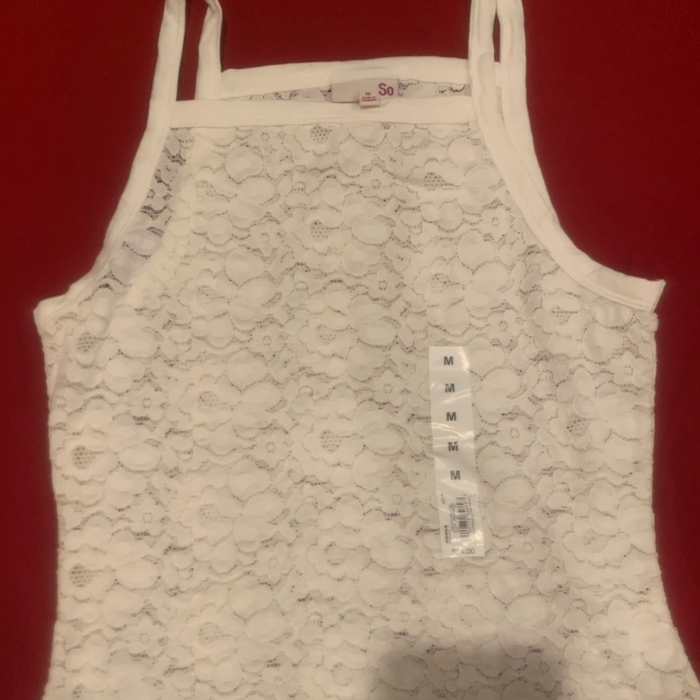 White tank with design in it